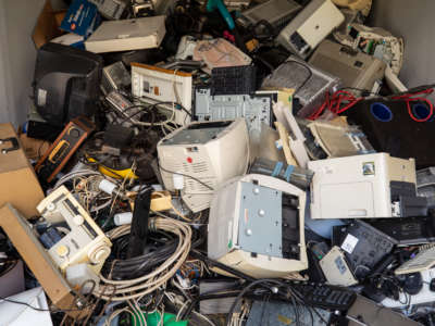 Electronic scrap piled at a recycling yard.