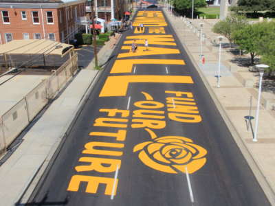 Local activists with the No Border Wall Laredo Coalition painted a street mural in front of the George P. Kazen federal building on August 16, 2020.