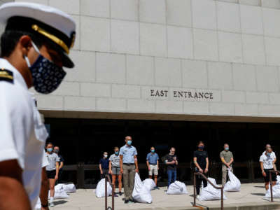 Plebes wait to receive instruction from a Midshipman on Induction Day on June 30, 2020, at the U.S. Naval Academy in Annapolis, Maryland.