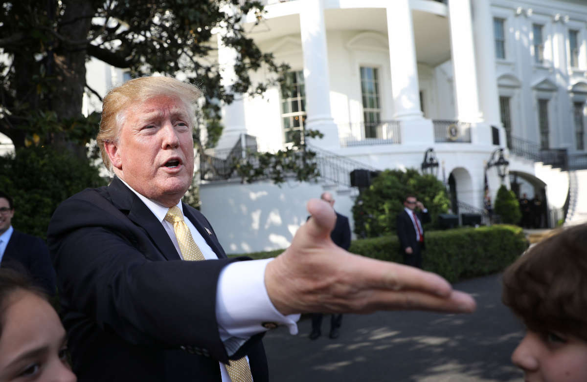 President Trump greets children on the south lawn of the White House, April 25, 2019, in Washington, D.C.