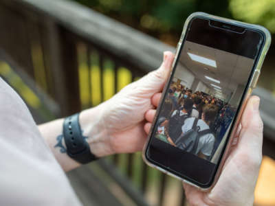 Amanda Seghetti shows a picture of a congested hallway at a school in Georgia on August 7, 2020.