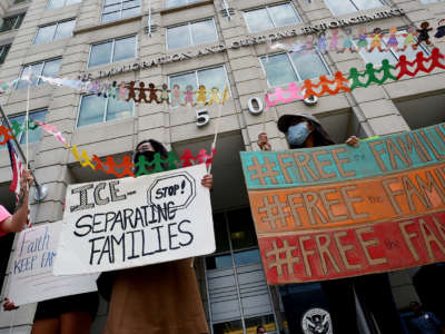 Demonstrators protest outside the Immigration and Customs Enforcement (ICE) headquarters to demand the release of immigrant families in detention centers at risk during the coronavirus pandemic, in Washington, D.C., on July 17, 2020.