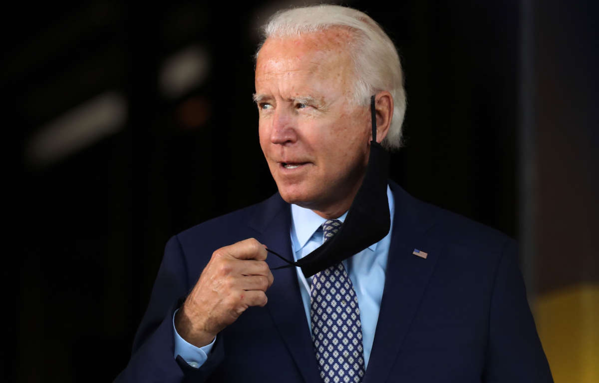 The presumptive Democratic presidential nominee Joe Biden walks on to stage as he speaks at McGregor Industries on July 9, 2020, in Dunmore, Pennsylvania.