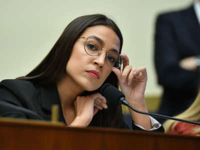 Rep. Alexandria Ocasio-Cortez listens during a House Financial Services Committee in the Rayburn House Office Building in Washington, D.C. on October 23, 2019.