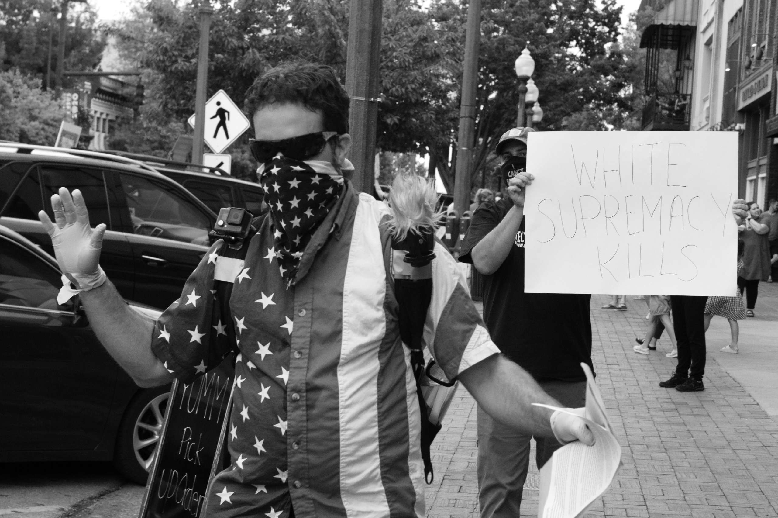 Local instigator David Carson distributes pamphlets labeling protesters as “angry communists.”