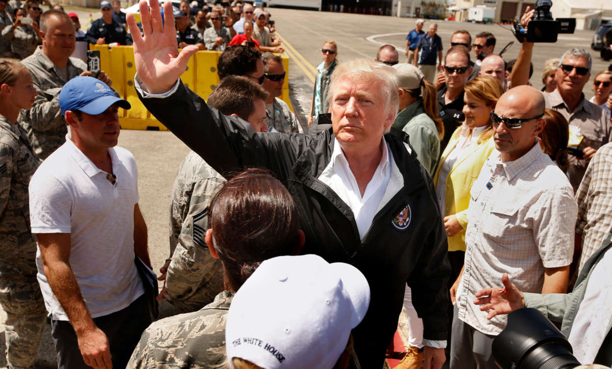 President Trump and the First Lady arrive at the Muniz Air National Guard Base in Carolina, Puerto Rico, on October 3, 2017.