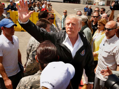 President Trump and the First Lady arrive at the Muniz Air National Guard Base in Carolina, Puerto Rico, on October 3, 2017.