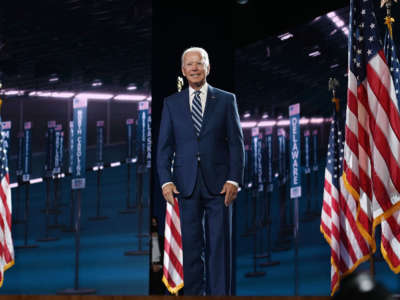 Former vice-president and Democratic presidential nominee Joe Biden stands on stage at the end of the third day of the Democratic National Convention, at the Chase Center in Wilmington, Delaware, on August 19, 2020.