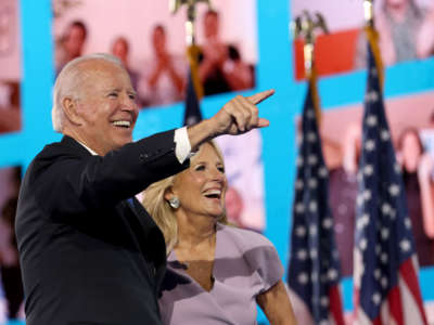 Democratic presidential nominee Joe Biden and his wife Dr. Jill Biden interact with supporters via video teleconference on the fourth night of the Democratic National Convention from the Chase Center on August 20, 2020, in Wilmington, Delaware.