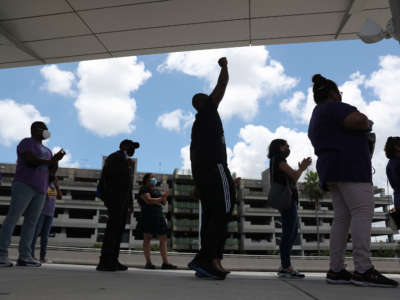 Demonstrators demand that Delta Airlines contractor, Eulen America, hire back unemployed Fort Lauderdale-Hollywood International Airport workers on August 13, 2020, in Fort Lauderdale, Florida.