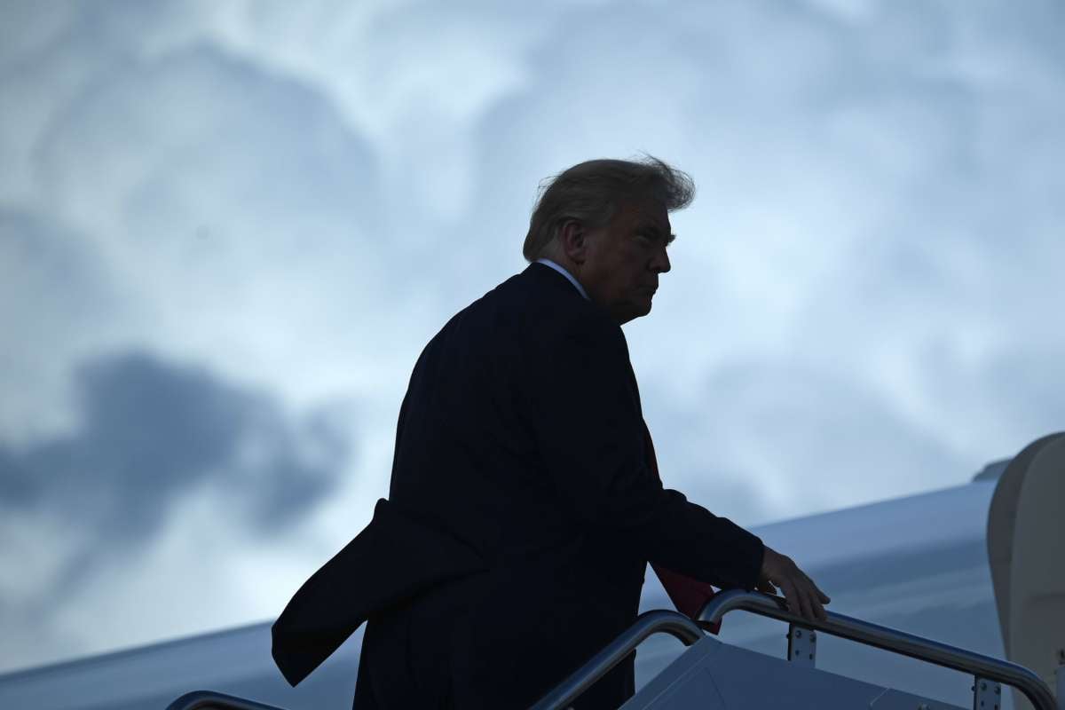 Donald Trump boards air force one