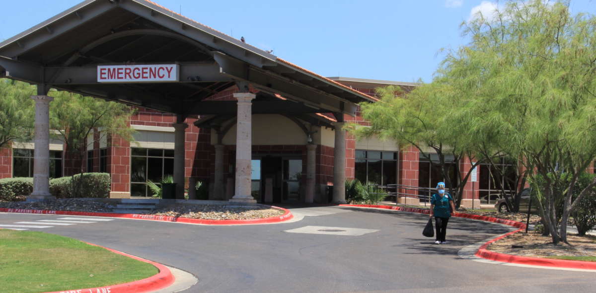 A nurse exits the Laredo Medical Center on August 16, 2020.