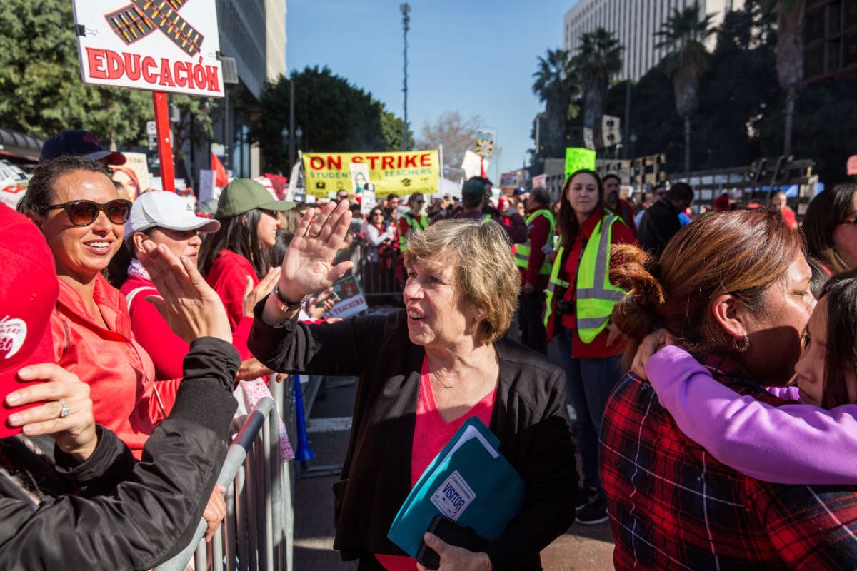 American Federation of Teachers president Randi Weingarten greets a crowd of striking teachers in Grand Park on January 22, 2019, in downtown Los Angeles, California.