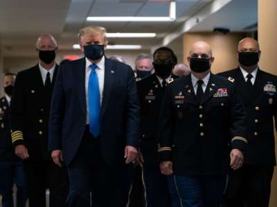 Donald Trump wears a mask as he visits Walter Reed National Military Medical Center in Bethesda, Maryland, on July 11, 2020.