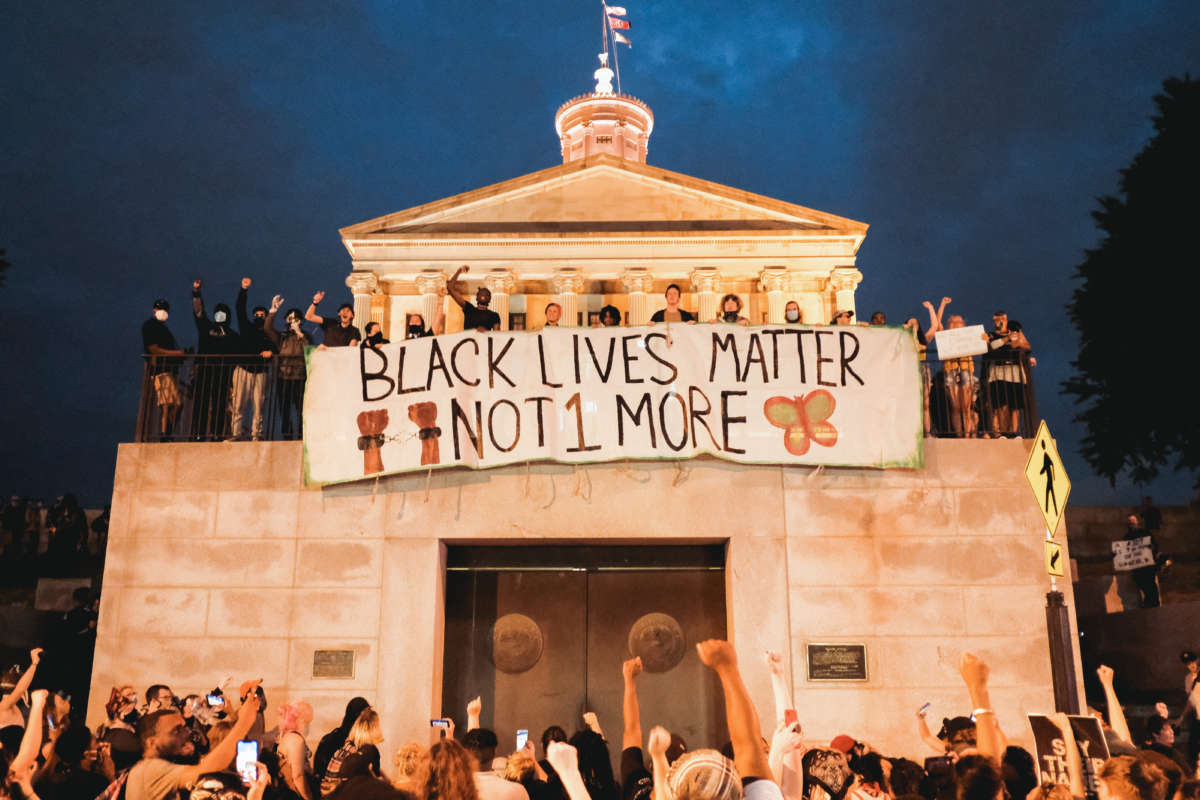 Protesters are seen marching upon the Tennessee State Capitol building on June 4, 2020, in Nashville, Tennessee.