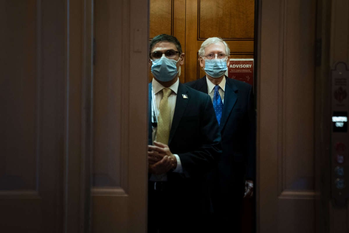 Senate Majority Leader Mitch McConnell gets into an elevator as he leaves the Senate floor at the U.S. Capitol on September 23, 2020, in Washington, D.C.