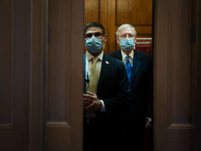 Senate Majority Leader Mitch McConnell gets into an elevator as he leaves the Senate floor at the U.S. Capitol on September 23, 2020, in Washington, D.C.