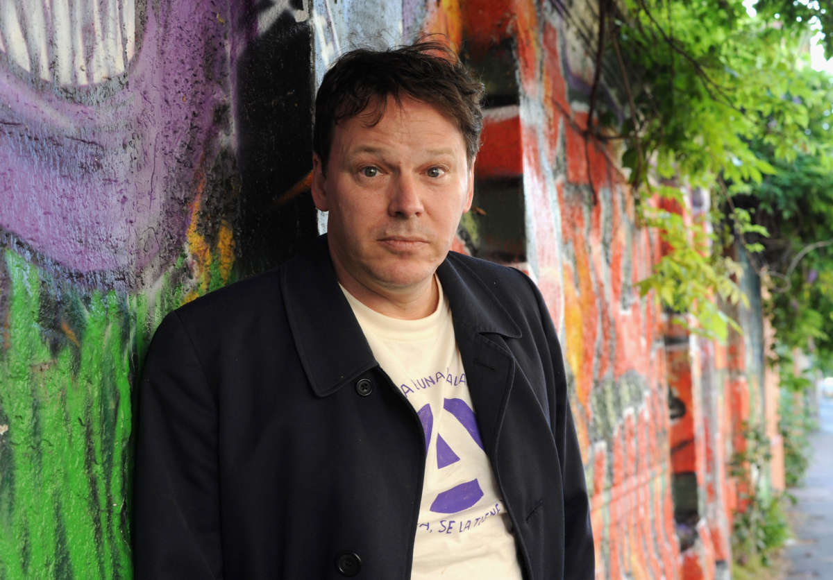 David Graeber poses for a photo at an Occupy Movement public debate on June 13, 2012, in Milan, Italy.