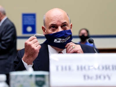 U.S. Postal Service Postmaster General Louis DeJoy arrives to testify at a House Oversight and Reform Committee hearing in the Rayburn House Office Building on August 24, 2020, on Capitol Hill in Washington, D.C.