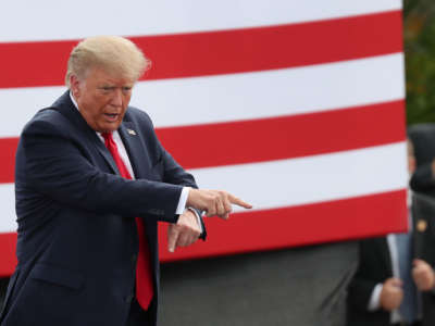 President Trump gestures as he leaves after speaking at the Jupiter Inlet Lighthouse on September 8, 2020, in Jupiter, Florida.