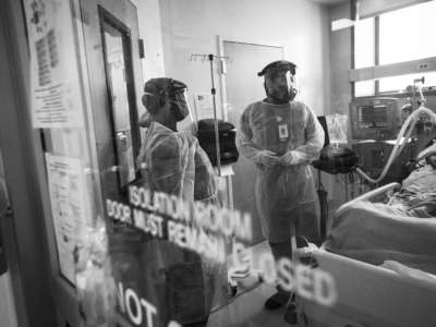 An ICU nurse and doctor work together in the ICU with a COVID-19 positive patient at Martin Luther King, Jr. Community Hospital on May 6, 2020, in South Los Angeles, California.