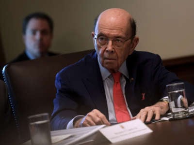 Secretary of Commerce Wilbur Ross listens during a cabinet meeting in the Cabinet Room of the White House, October 21, 2019, in Washington, D.C.