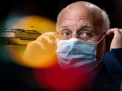 CDC Director Robert Redfield puts on a mask with Florida cruise ship behind