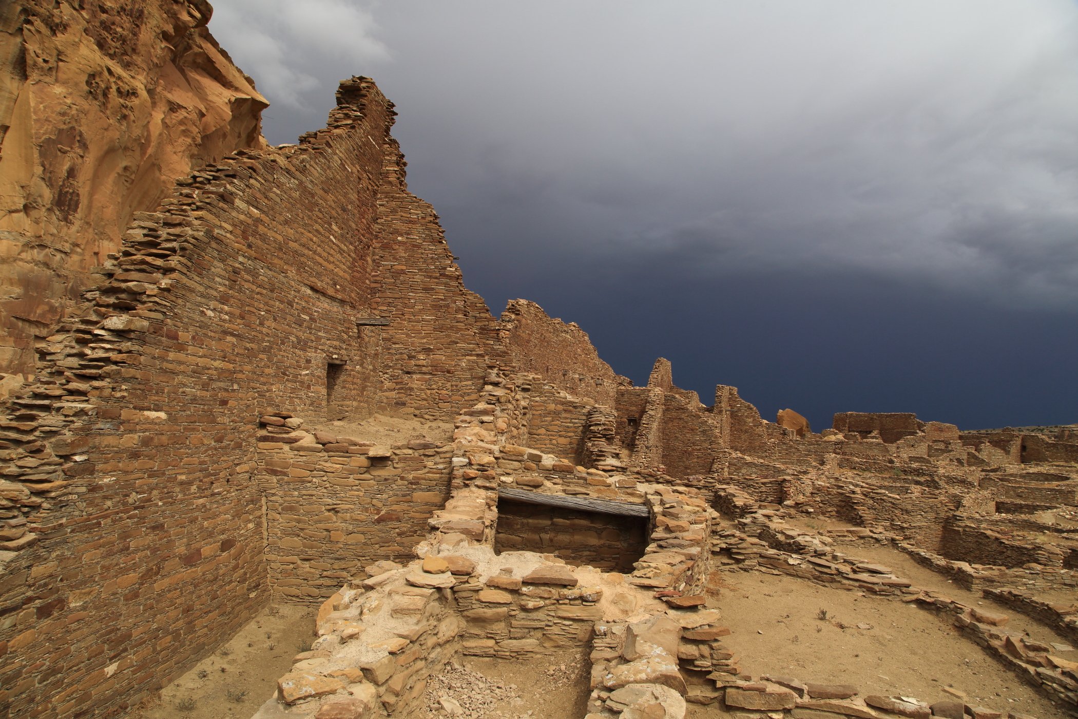 Stormy sky frames ruins of the Pueblo Bonito great house, once five-stories tall, in Chaco Culture National Historical Park in northwest New Mexico.