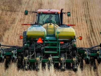 A farmer plants corn in Mount Airy, Maryland, on May 19, 2020.