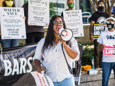 Queens residents, community group protest and demand that Queens District Attorney Melinda Katz takes immediate action to stop the spread of COVID-19 in jails and decarcerate during a protest in New York City on July 13, 2020.