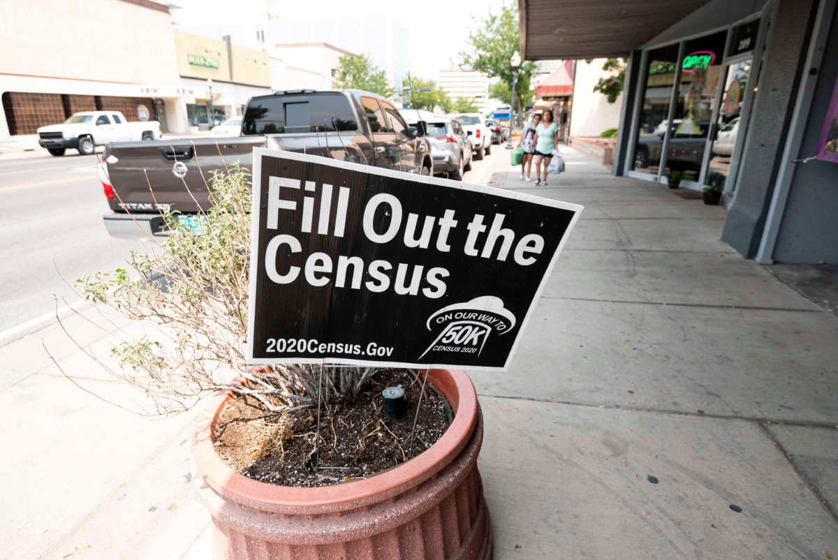 A "Fill Out the Census" sign stands in a planter on Main Street in Roswell, New Mexico, on August 21, 2020.