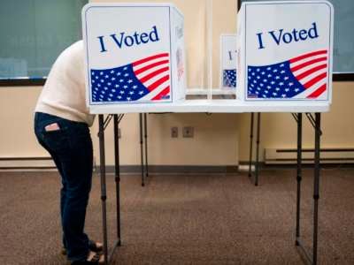 Voters cast their ballots for the 2020 election at an early, in-person voting location in Arlington, Virginia, on September 18, 2020.