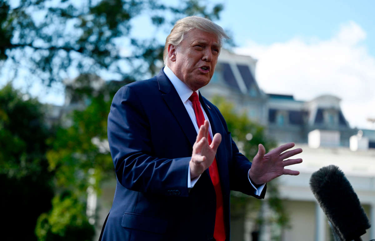 President Trump speaks to the media as he walks to Marine One on the South Lawn of the White House in Washington, D.C., on September 30, 2020.