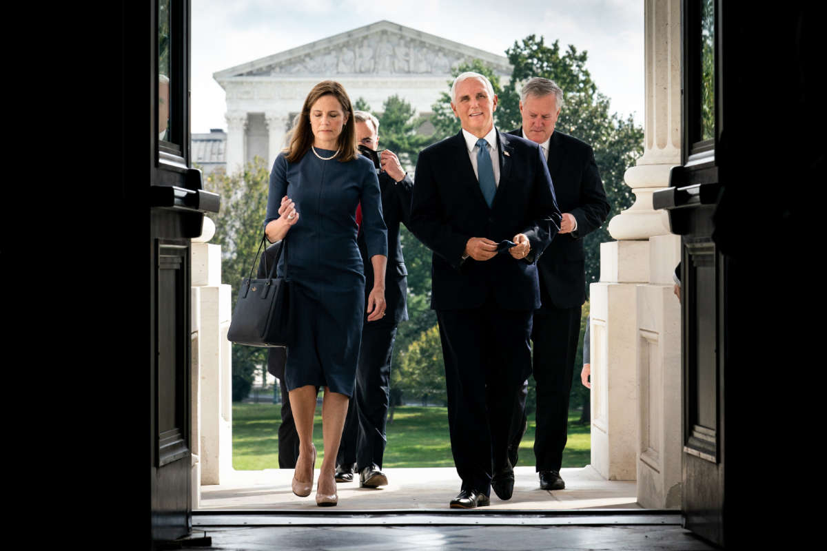 Seventh U.S. Circuit Court Judge Amy Coney Barrett, President Donald Trump's nominee for the U.S. Supreme Court, and Vice President Mike Pence arrive at the U.S. Capitol on September 29, 2020, in Washington, D.C.