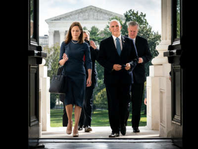 Seventh U.S. Circuit Court Judge Amy Coney Barrett, President Donald Trump's nominee for the U.S. Supreme Court, and Vice President Mike Pence arrive at the U.S. Capitol on September 29, 2020, in Washington, D.C.