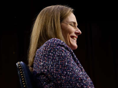 Supreme Court nominee Amy Coney Barrett smiles at the end of her Senate Judiciary Committee confirmation hearing on Capitol Hill on October 14, 2020, in Washington, D.C.