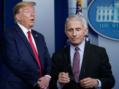 Dr. Anthony Fauci, director of the National Institute of Allergy and Infectious Diseases, and President Trump participate in the daily coronavirus task force briefing at the White House on April 22, 2020, in Washington, D.C.
