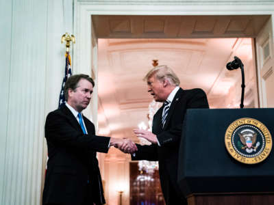 Associate Justice Brett Kavanaugh greets President Trump during a swearing-in ceremony in the East Room of the White House on October 8, 2018, in Washington, D.C.