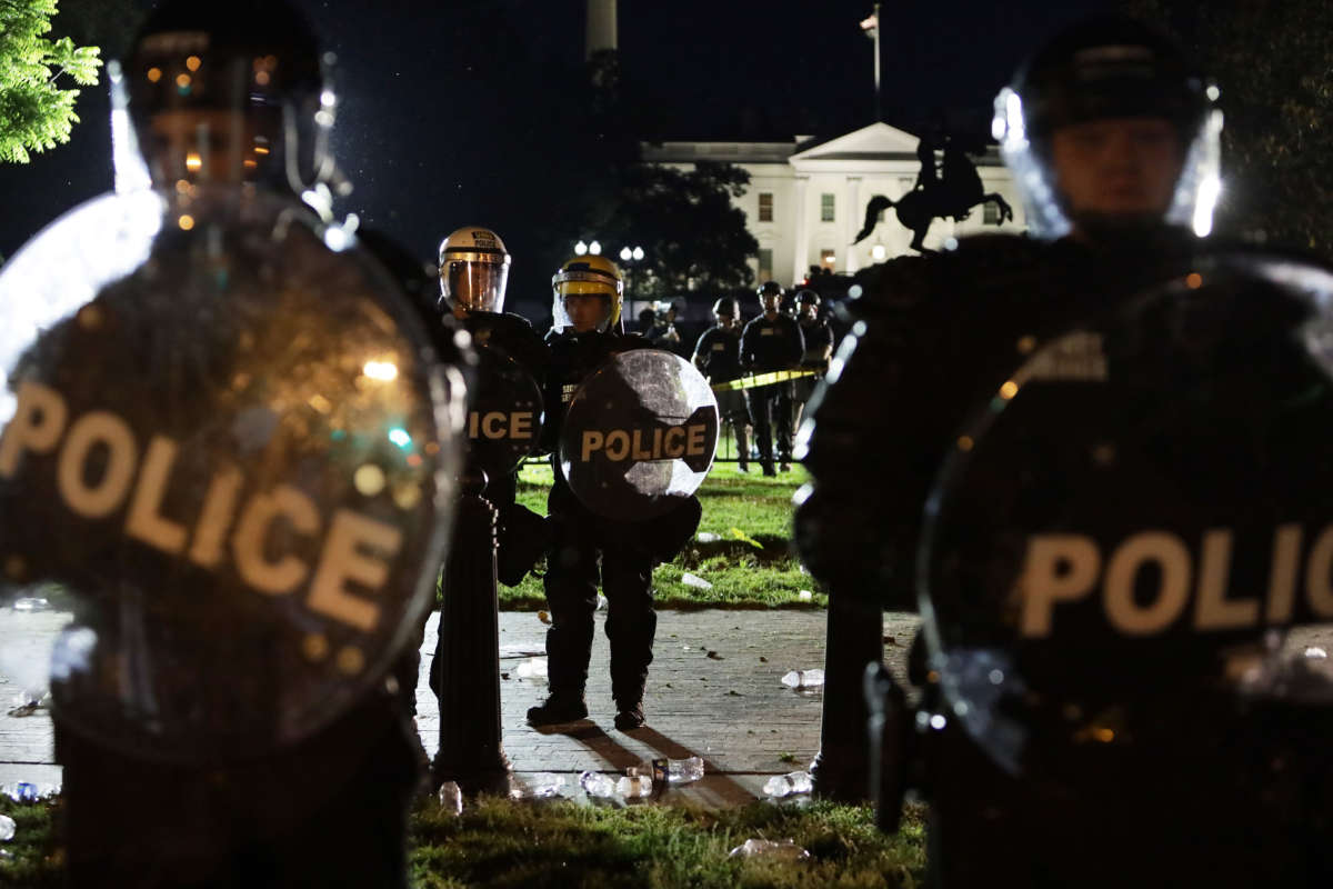 Members of the U.S. Secret Service hold a perimeter near the White House as demonstrators gather to protest the killing of George Floyd on May 30, 2020, in Washington, D.C.