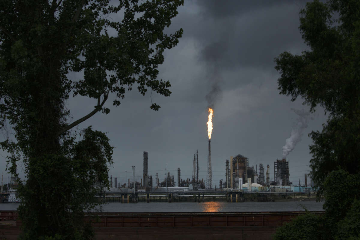 A gas flare from the Shell Chemical LP petroleum refinery illuminates the sky on August 21, 2019, in Norco, Louisiana.