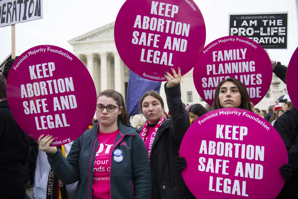 Reproductive rights demonstrators are seen in front of the Supreme Court on January 24, 2020.