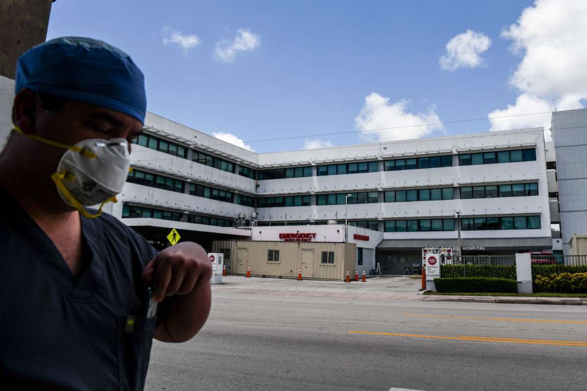 A medic walks outside of a hospital in Coral Gables near Miami, Florida, on July 30, 2020.