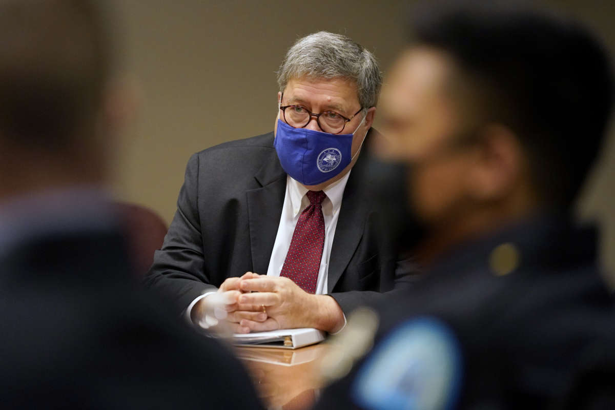 Attorney General William Barr meets with members of the St. Louis Police Department during a round table discussion on Operation Legend on October 15, 2020, in St Louis, Missouri.