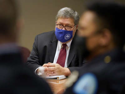 Attorney General William Barr meets with members of the St. Louis Police Department during a round table discussion on Operation Legend on October 15, 2020, in St Louis, Missouri.