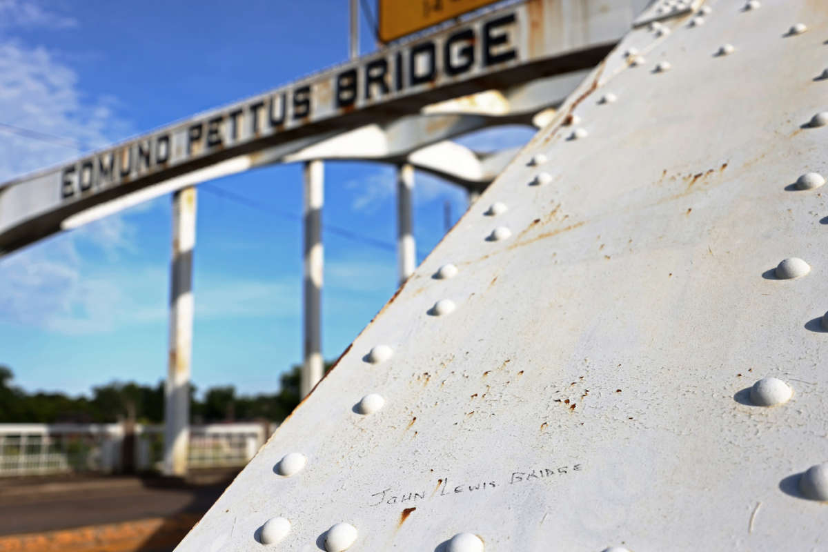 The words "John Lewis Bridge" are written in marker on the Edmund Pettus Bridge on July 26, 2020, in Selma, Alabama.