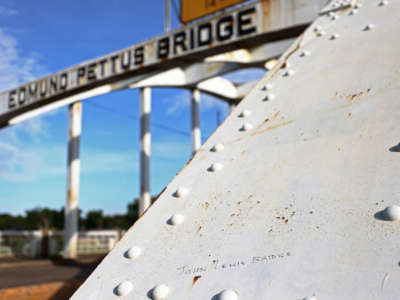 The words "John Lewis Bridge" are written in marker on the Edmund Pettus Bridge on July 26, 2020, in Selma, Alabama.