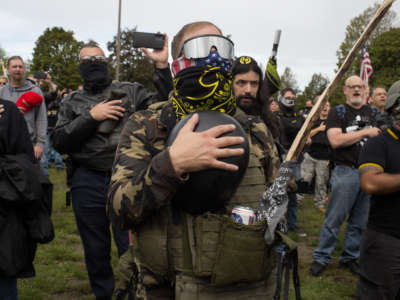 Members of the Proud Boys, a gang that supports President Trump, hold a rally on September 26, 2020, in Delta Park on the edge of Portland, Oregon.