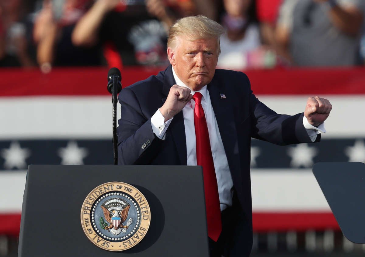 President Donald Trump dances to the music after speaking during his campaign event at The Villages Polo Club on October 23, 2020, in The Villages, Florida.