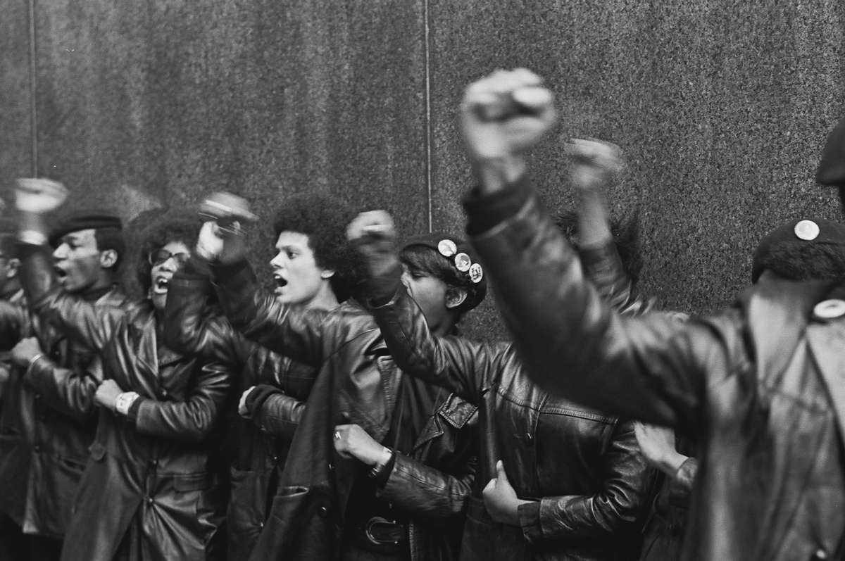 Black Panther Party members demonstrate, fists raised outside the New York City courthouse, New York, New York, on April 11, 1969.