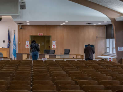 Flint residents cast their early vote at City Hall in Flint, Michigan, October 20, 2020.